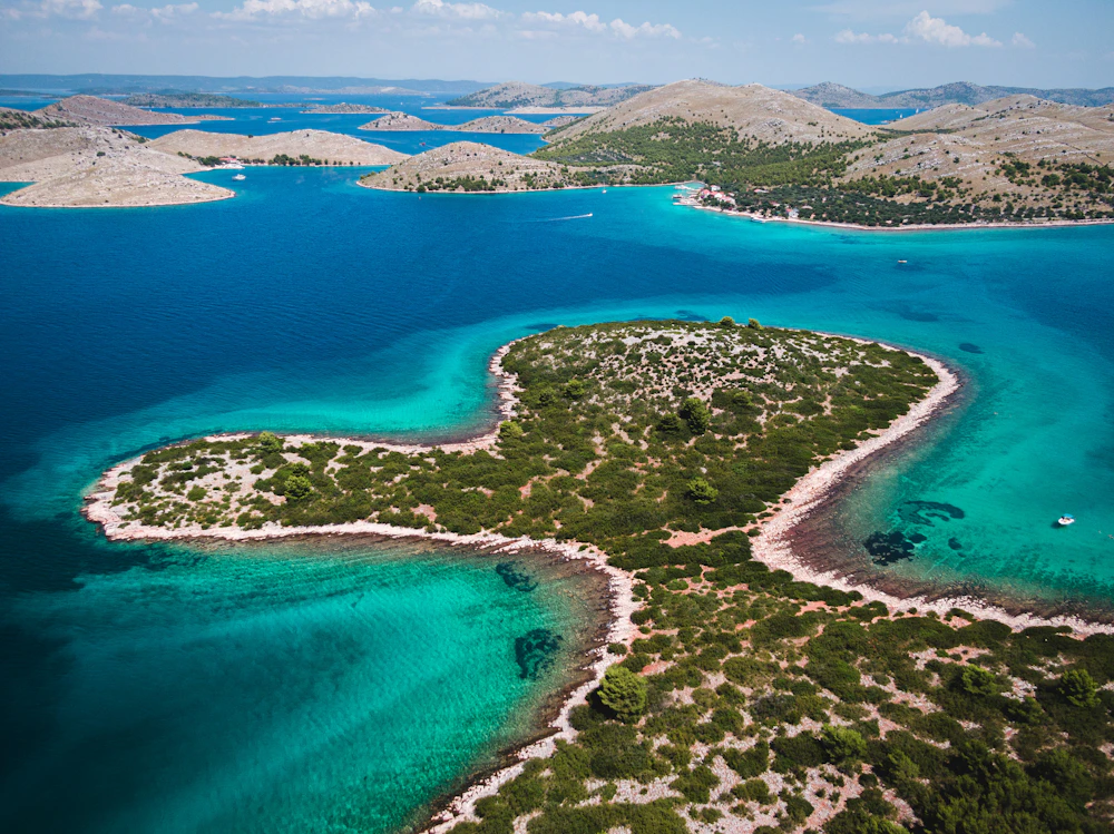 Turquoise Adriatic water winding between rocky Croatian islands